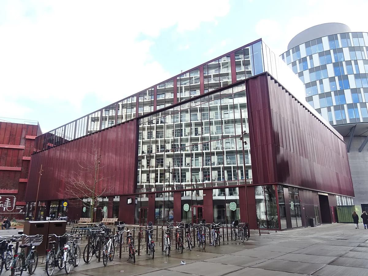 Big Bio cinema in Copenhagen with a reflected tower in its glass facade