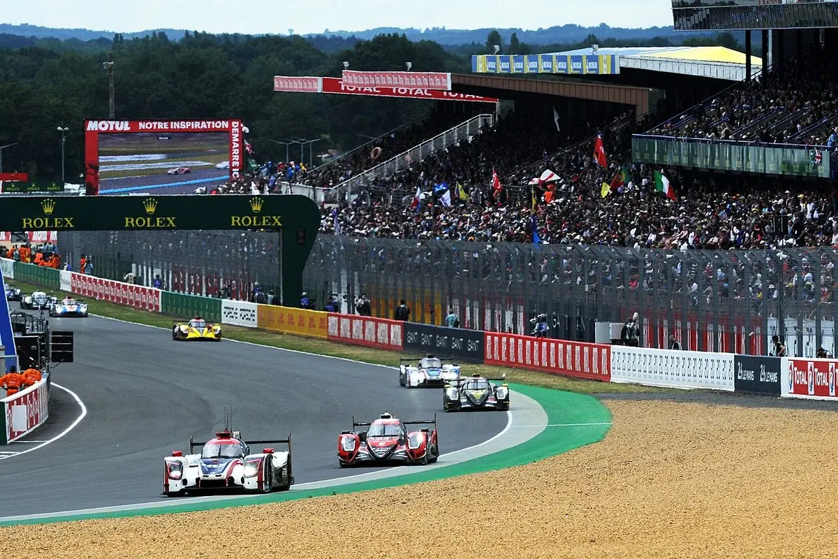 Crowd watching race cars at the 24 Hours of Le Mans.