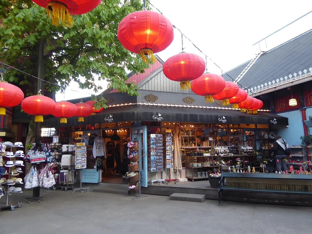 A gift shop in Tivoli Copenhagen decorated with red lanterns.
