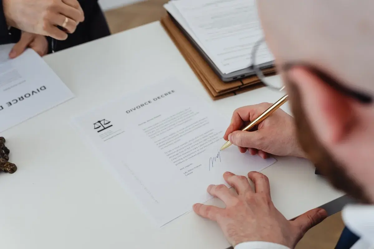 Person Signing Divorce Decree